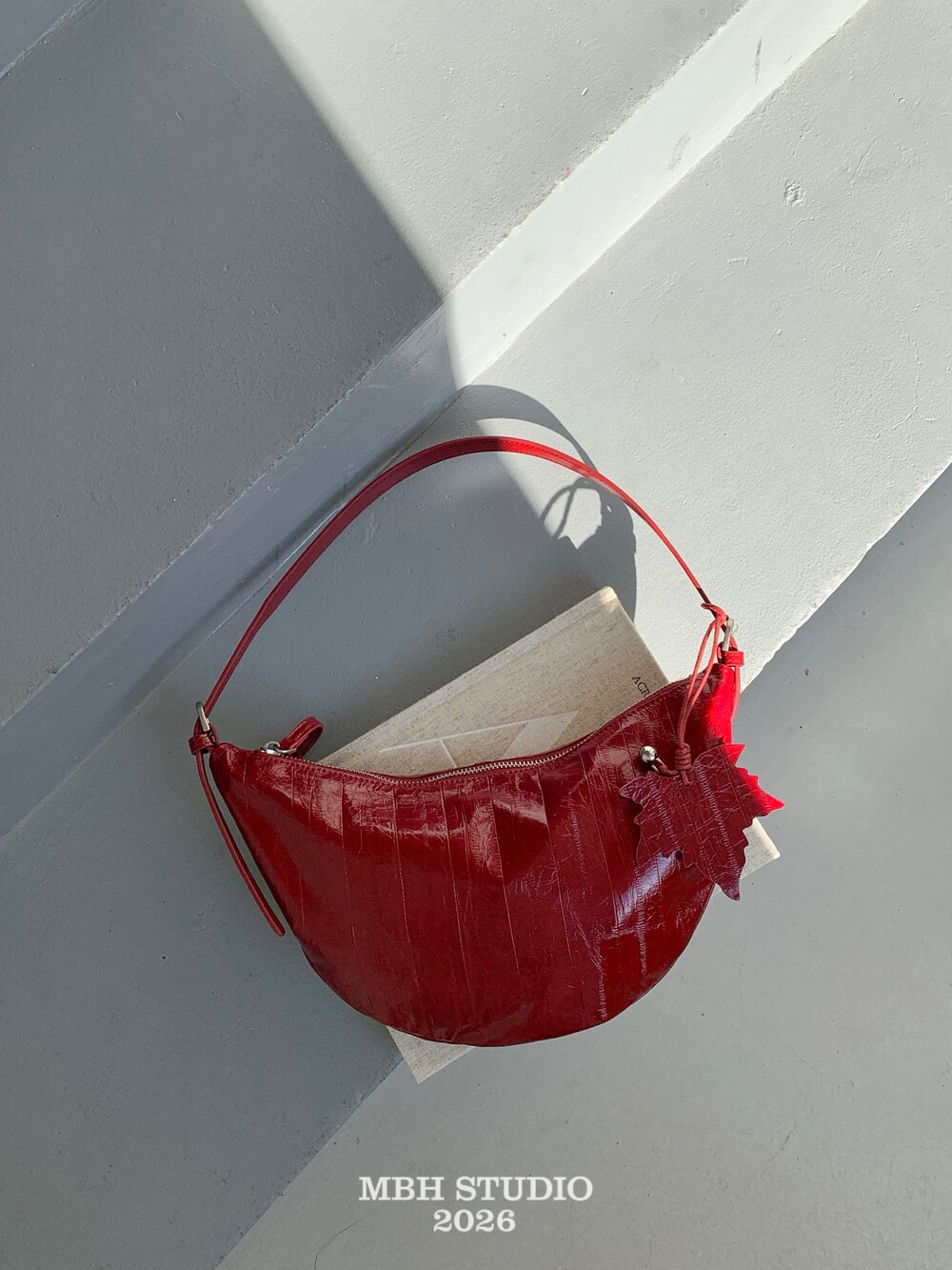 Eel Grain Top Layer Cowhide Crescent Shoulder Bag with Maple Leaf Charm - Image 4